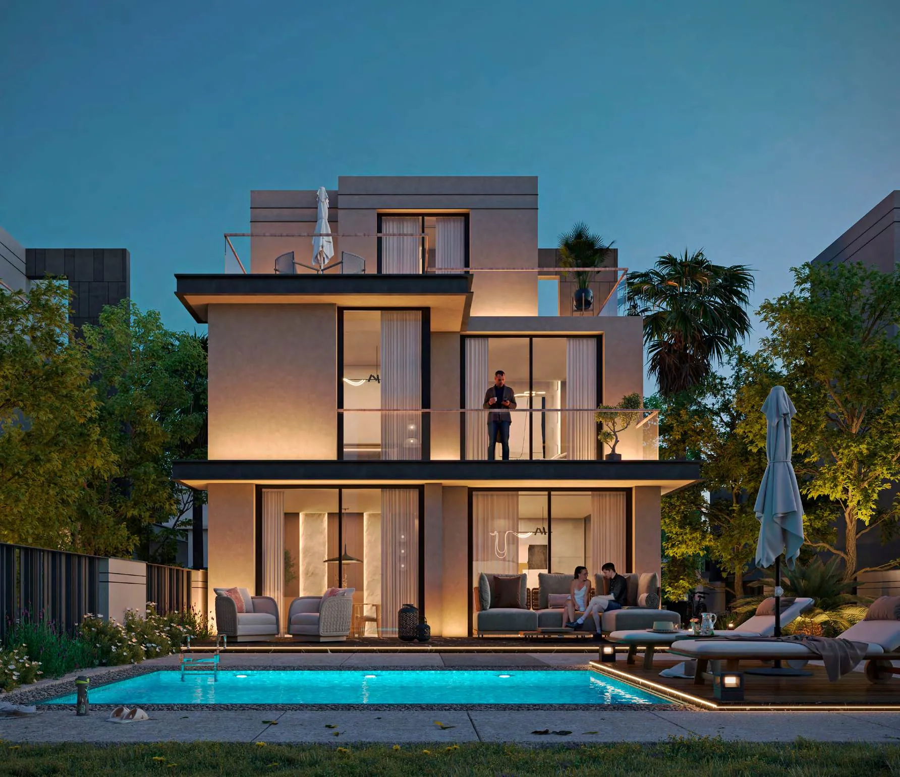 Palm Gardens villa at dusk, with a lit pool and terrace